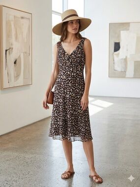 ADRIANNA PAPELL Sleeveless V-Neck Polka Dot Midi Dress in Brown and White.